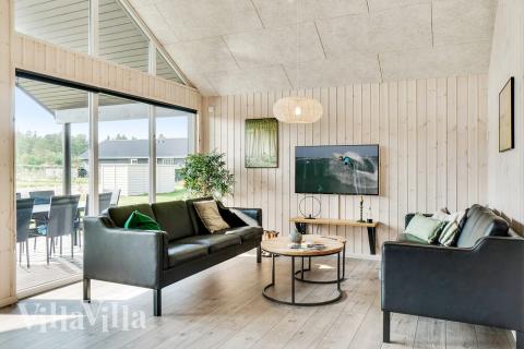 Aufenthaltsraum mit Platz für 16 im Luxusferienhaus Nr. 464.