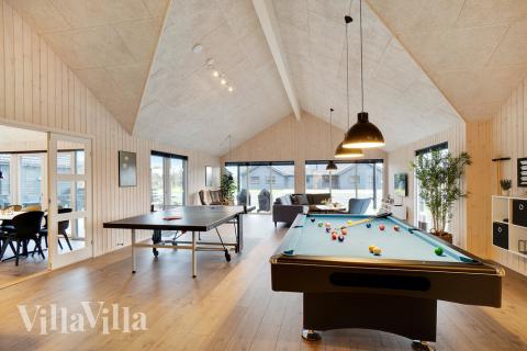 Aktivitätsraum im Luxusferienhaus Nr. 462 mit 10 Schlafzimmern und Platz für 26 Gäste.
