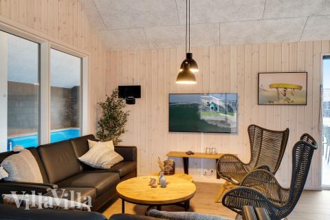 Aufenthaltsraum mit Platz für 26 im Luxusferienhaus Nr. 462.