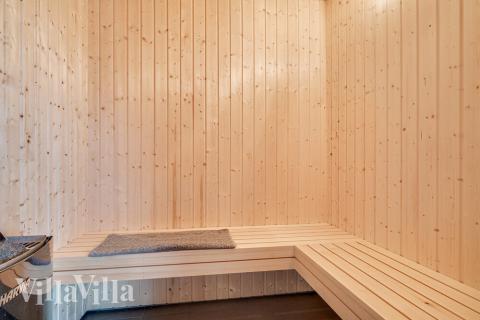 Genießen Sie die heiße Sauna im Luxusferienhaus Nr. 462 für 26 Personen