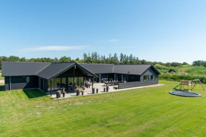 Dieses schöne Poolhaus Nr. 462 mit Platz für 26 Personen liegt in Westjütland