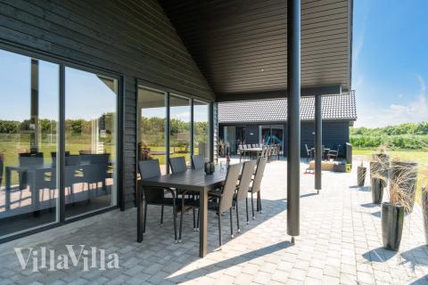 Das Luxusferienhaus Nr. 462 hat eine tolle Terrasse, die mit hochwertigen Gartenmöbeln für 26 Personen ausgestattet ist.