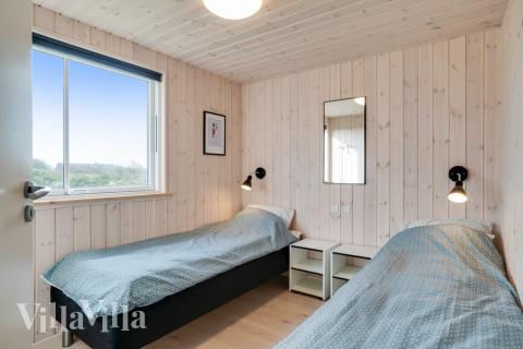 Eines der 7 Schlafzimmer im Luxusferienhaus Nr. 478