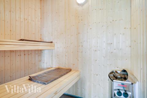 Genießen Sie die heiße Sauna im Luxusferienhaus Nr. 478 für 18 Personen