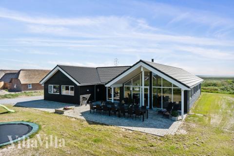 Dieses schöne Poolhaus Nr. 478 mit Platz für 18 Personen liegt in Westjütland