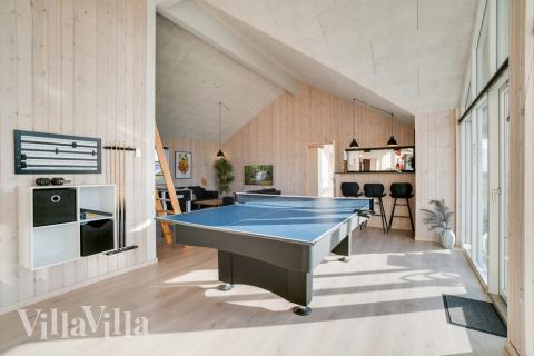 Aktivitätsraum im Luxusferienhaus Nr. 477 mit 7 Schlafzimmern und Platz für 18 Gäste.