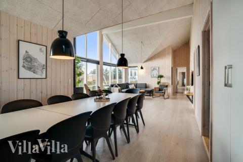 Aufenthaltsraum mit Platz für 18 im Luxusferienhaus Nr. 477.