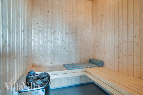 Genießen Sie die heiße Sauna im Luxusferienhaus Nr. 477 für 18 Personen