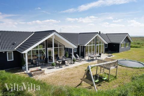 Dieses schöne Poolhaus Nr. 477 mit Platz für 18 Personen liegt in Westjütland