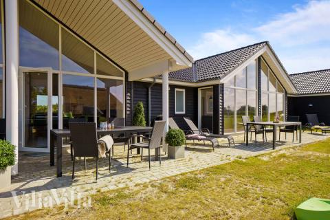 Das Luxusferienhaus Nr. 477 hat eine tolle Terrasse, die mit hochwertigen Gartenmöbeln für 18 Personen ausgestattet ist.