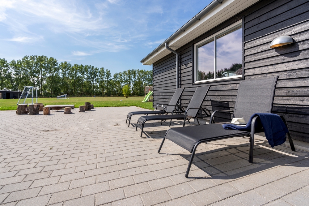 Das Luxusferienhaus Nr. 470 hat eine tolle Terrasse, die mit hochwertigen Gartenmöbeln für 24 Personen ausgestattet ist.