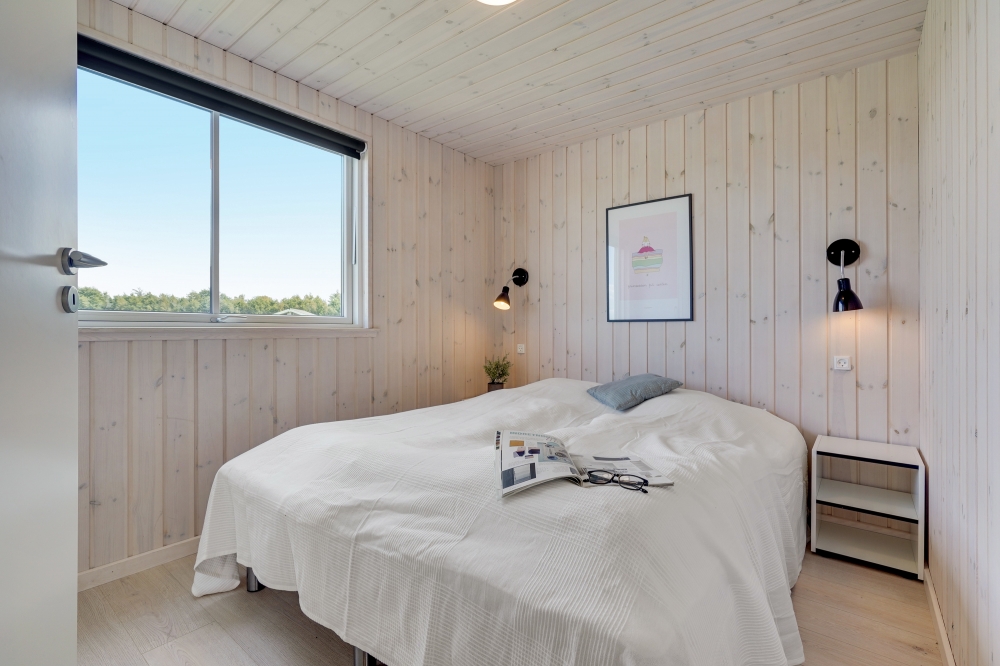 Eines der 9 Schlafzimmer im Luxusferienhaus Nr. 470