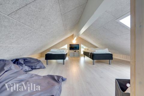 Der große ausgebaute Dachboden im Luxusferienhaus Nr. 470 für 24 Personen