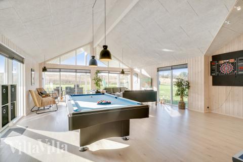 Das Luxusferienhaus 479 für 26 Personen hat einen großen Aktivitätsraum mit u. a. Billard und Darts