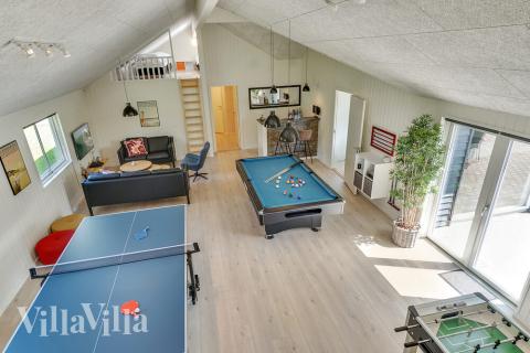 Neben den vielen schönen Stunden, die man im Poolbereich des Hauses verbringen kann, bietet das Luxusferienhaus 480 auch Spielevergnügen bei Billard/Tischtennis und Darts