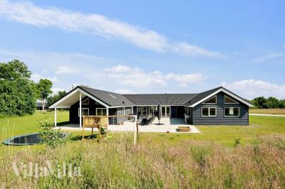 Dieses schöne Poolhaus Nr. 480 mit Platz für 24 Personen liegt in Ostjütland
