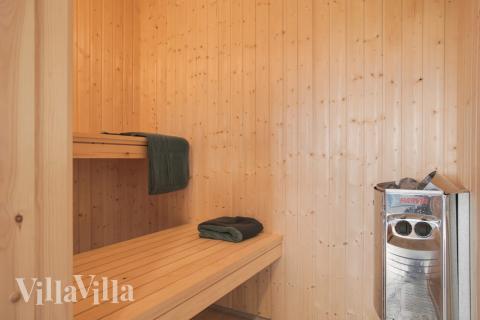 Genießen Sie die heiße Sauna im Luxusferienhaus Nr. 481 für 16 Personen