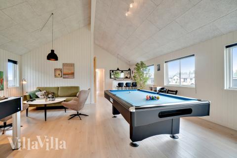 Neben den vielen schönen Stunden, die man im Poolbereich des Hauses verbringen kann, bietet das Luxusferienhaus 484 auch Spielevergnügen bei Billard/Tischtennis und Darts