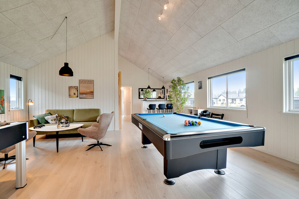 Neben den vielen schönen Stunden, die man im Poolbereich des Hauses verbringen kann, bietet das Luxusferienhaus 484 auch Spielevergnügen bei Billard/Tischtennis und Darts