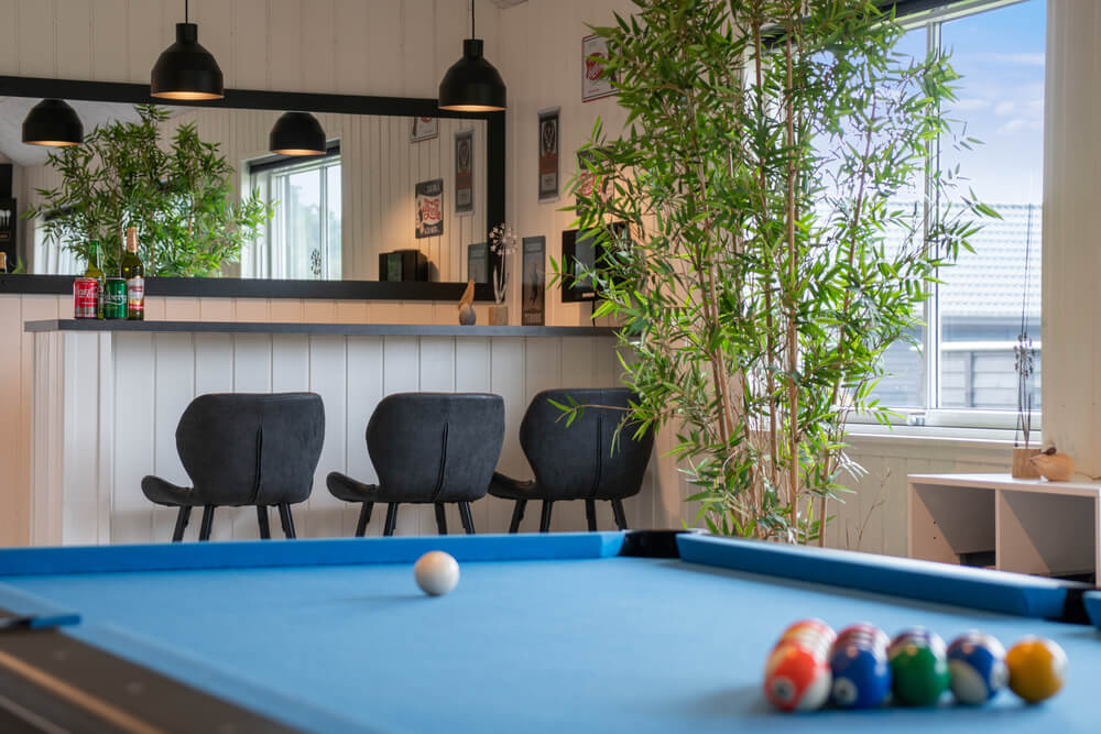 Aktivitätsraum im Luxusferienhaus Nr. 484 mit 7 Schlafzimmern und Platz für 18 Gäste.
