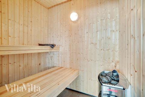 Genießen Sie die heiße Sauna im Luxusferienhaus Nr. 484 für 18 Personen