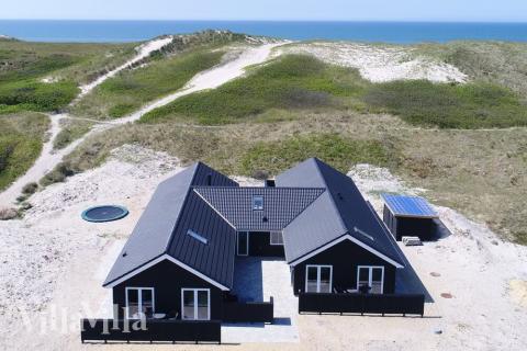 Dieses schöne Poolhaus Nr. 486 mit Platz für 20 Personen liegt in Westjütland