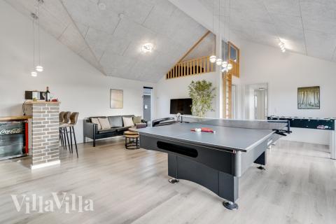 Neben den vielen schönen Stunden, die man im Poolbereich des Hauses verbringen kann, bietet das Luxusferienhaus 486 auch Spielevergnügen bei Billard/Tischtennis und Darts