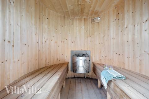 Genießen Sie die heiße Sauna im Luxusferienhaus Nr. 486 für 20 Personen