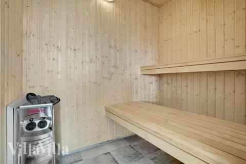 Genießen Sie die heiße Sauna im Luxusferienhaus Nr. 490 für 18 Personen