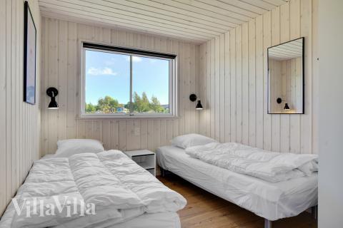 Eines der 7 Schlafzimmer im Luxusferienhaus Nr. 490