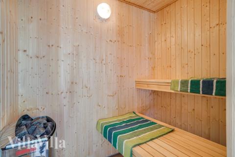 Genießen Sie die heiße Sauna im Luxusferienhaus Nr. 494 für 18 Personen