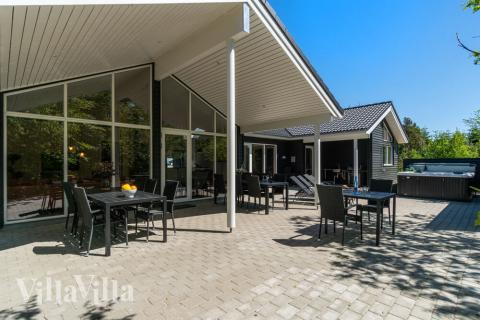 Genießen Sie einen Grillabend auf der Terrasse des Luxusferienhauses Nr. 494 in Nordjütland