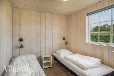 Eines der 10 Schlafzimmer im Luxusferienhaus Nr. 500