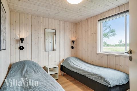 Eines der 7 Schlafzimmer im Luxusferienhaus Nr. 492