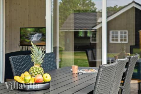 Genießen Sie einen Grillabend auf der Terrasse des Luxusferienhauses Nr. 492 in Ostjütland