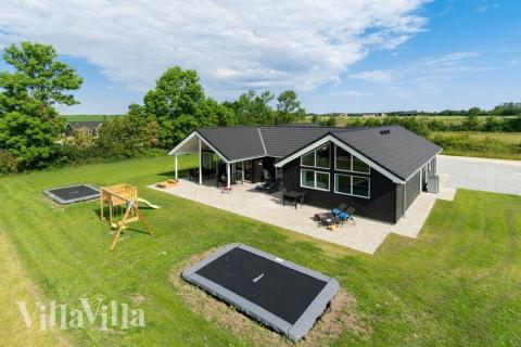 Dieses schöne Poolhaus Nr. 492 mit Platz für 18 Personen liegt in Ostjütland