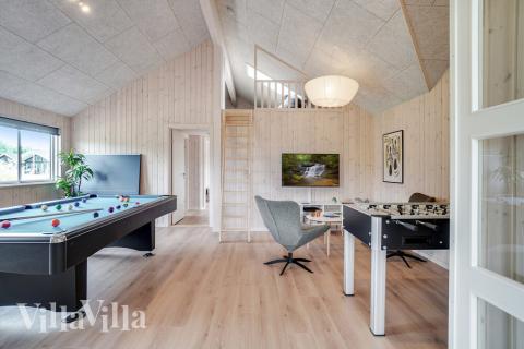 Neben den vielen schönen Stunden, die man im Poolbereich des Hauses verbringen kann, bietet das Luxusferienhaus 501 auch Spielevergnügen bei Billard/Tischtennis und Darts