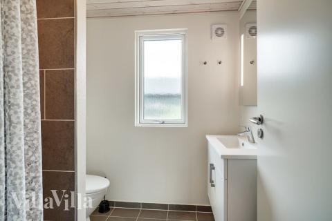 Eines der Badezimmer im Luxusferienhaus Nr. 501