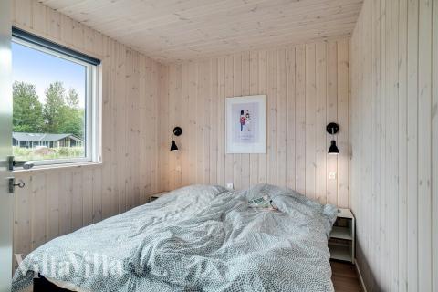 Eines der 5 Schlafzimmer im Luxusferienhaus Nr. 501