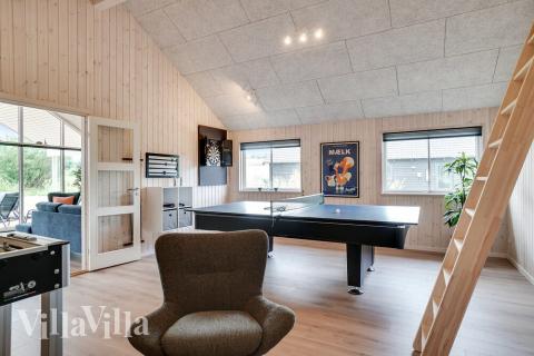 Das Luxusferienhaus 501 für 14 Personen hat einen großen Aktivitätsraum mit u. a. Billard und Darts