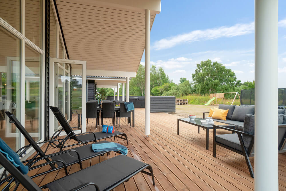 Das Luxusferienhaus Nr. 501 hat eine tolle Terrasse, die mit hochwertigen Gartenmöbeln für 14 Personen ausgestattet ist.