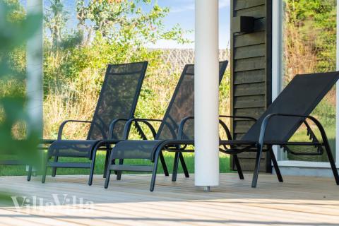 Genießen Sie einen Grillabend auf der Terrasse des Luxusferienhauses Nr. 504 in Nordseeland