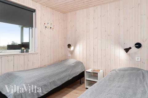 Eines der 9 Schlafzimmer im Luxusferienhaus Nr. 730