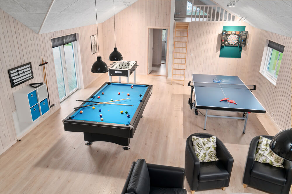 Neben den vielen schönen Stunden, die man im Poolbereich des Hauses verbringen kann, bietet das Luxusferienhaus 730 auch Spielevergnügen bei Billard/Tischtennis und Darts