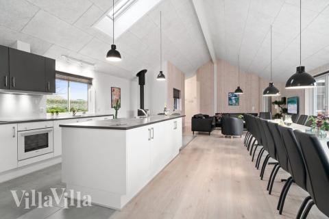 Aufenthaltsraum mit Platz für 24 im Luxusferienhaus Nr. 730.