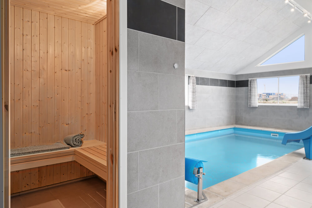 Genießen Sie die heiße Sauna im Luxusferienhaus Nr. 730 für 24 Personen