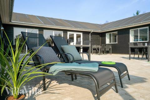 Das Luxusferienhaus Nr. 727 hat eine tolle Terrasse, die mit hochwertigen Gartenmöbeln für 24 Personen ausgestattet ist.