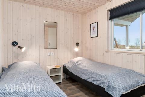 Eines der 9 Schlafzimmer im Luxusferienhaus Nr. 727