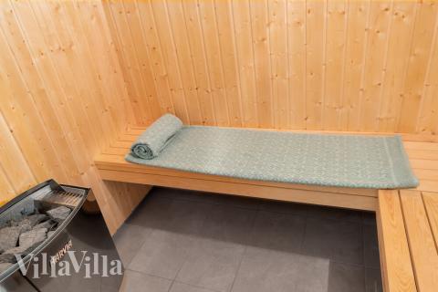 Genießen Sie die heiße Sauna im Luxusferienhaus Nr. 727 für 24 Personen