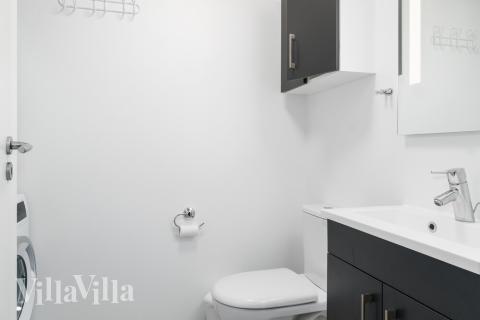 Eines der Badezimmer im Luxusferienhaus Nr. 728